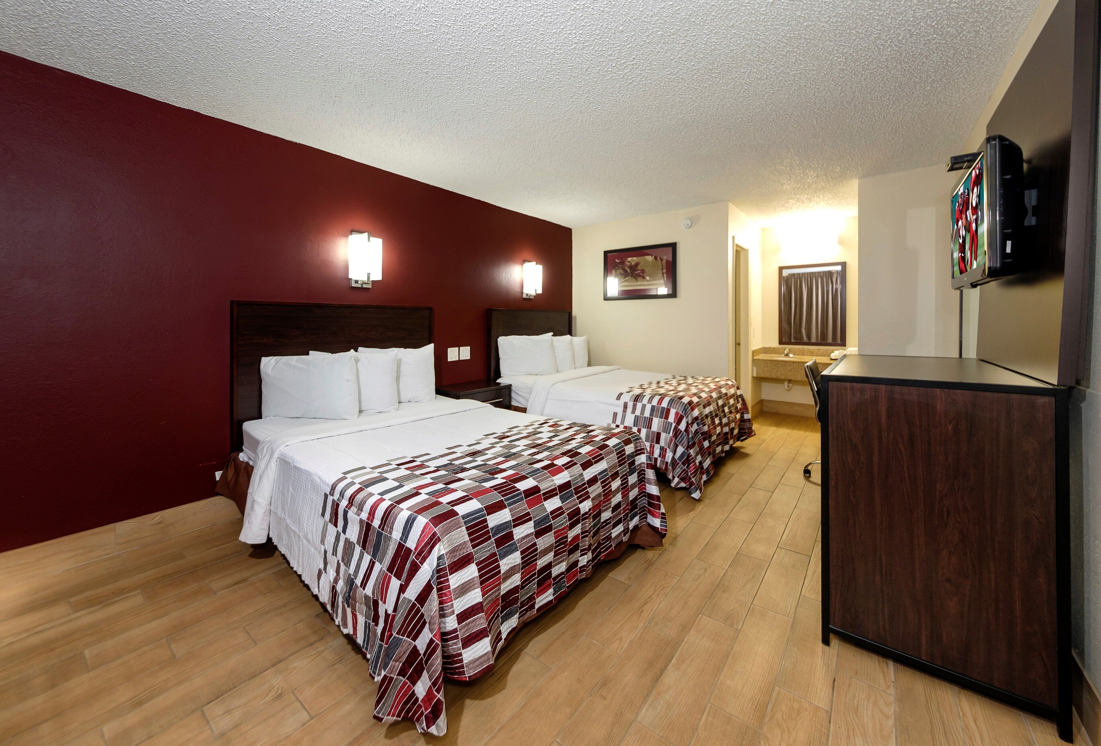 Desk, cribs (free), rollaway beds (surcharge), WiFi (free)