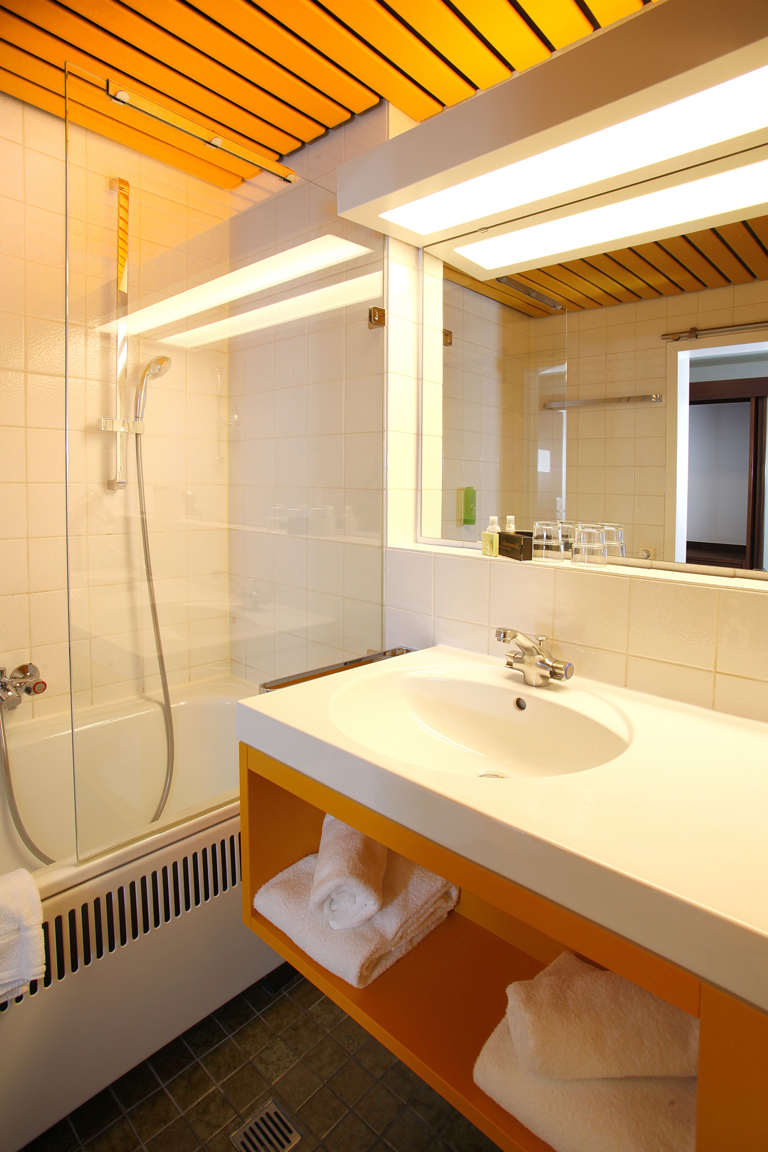 bathtub, free toiletries, hair dryer, bathrobes