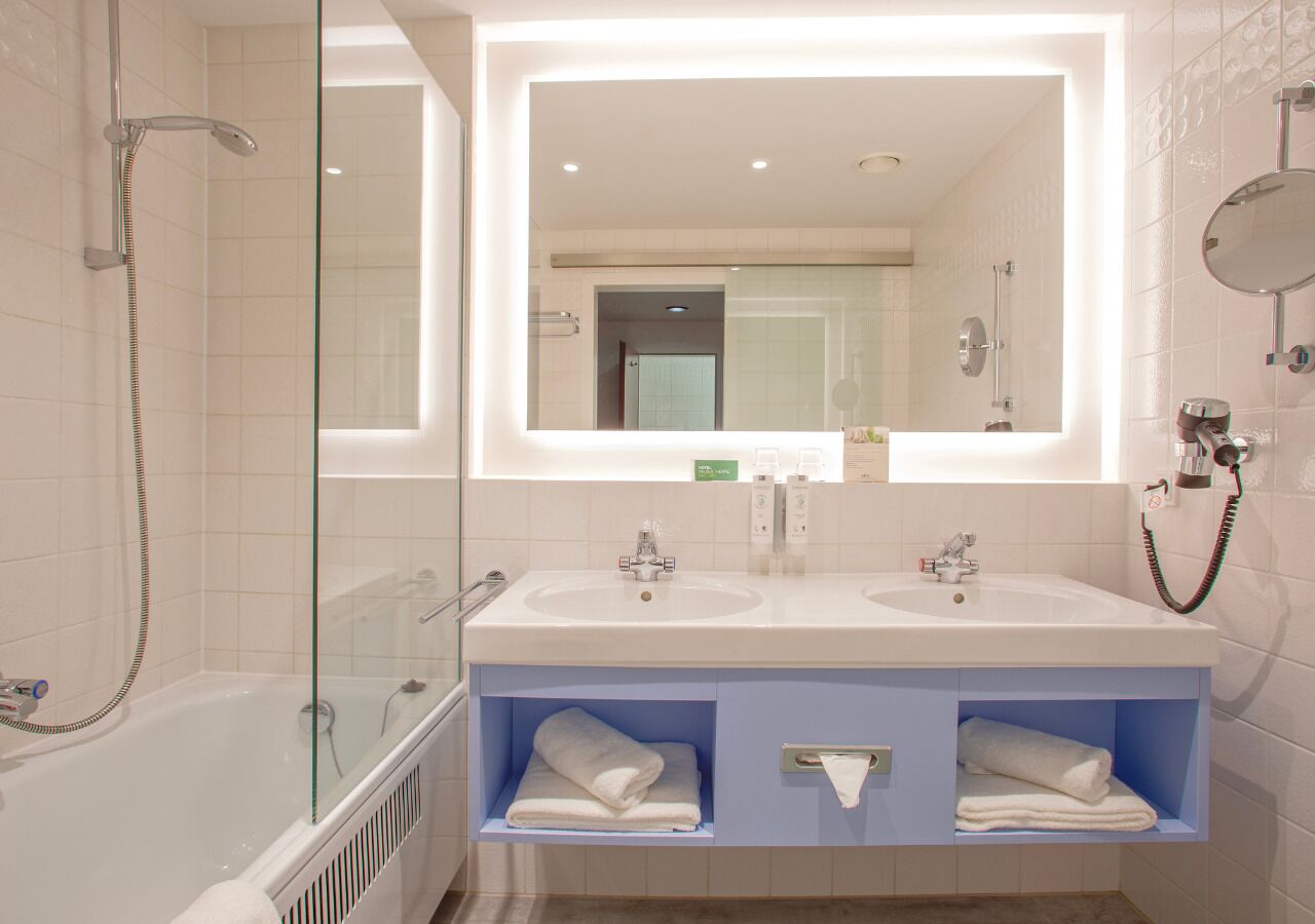 bathtub, free toiletries, hair dryer, bathrobes