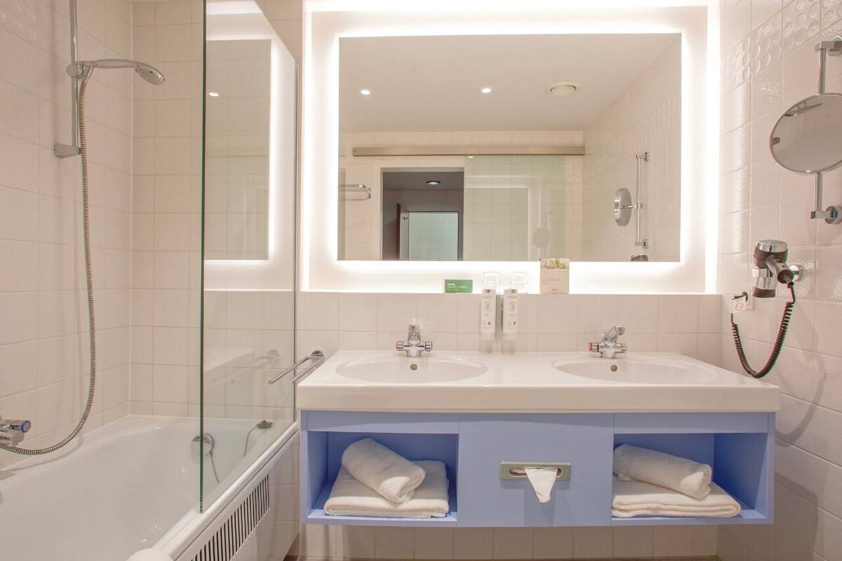 bathtub, free toiletries, hair dryer, bathrobes