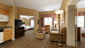 Suite, Multiple Beds, Non Smoking | Living area | 47-inch LCD TV with cable channels, TV, DVD player