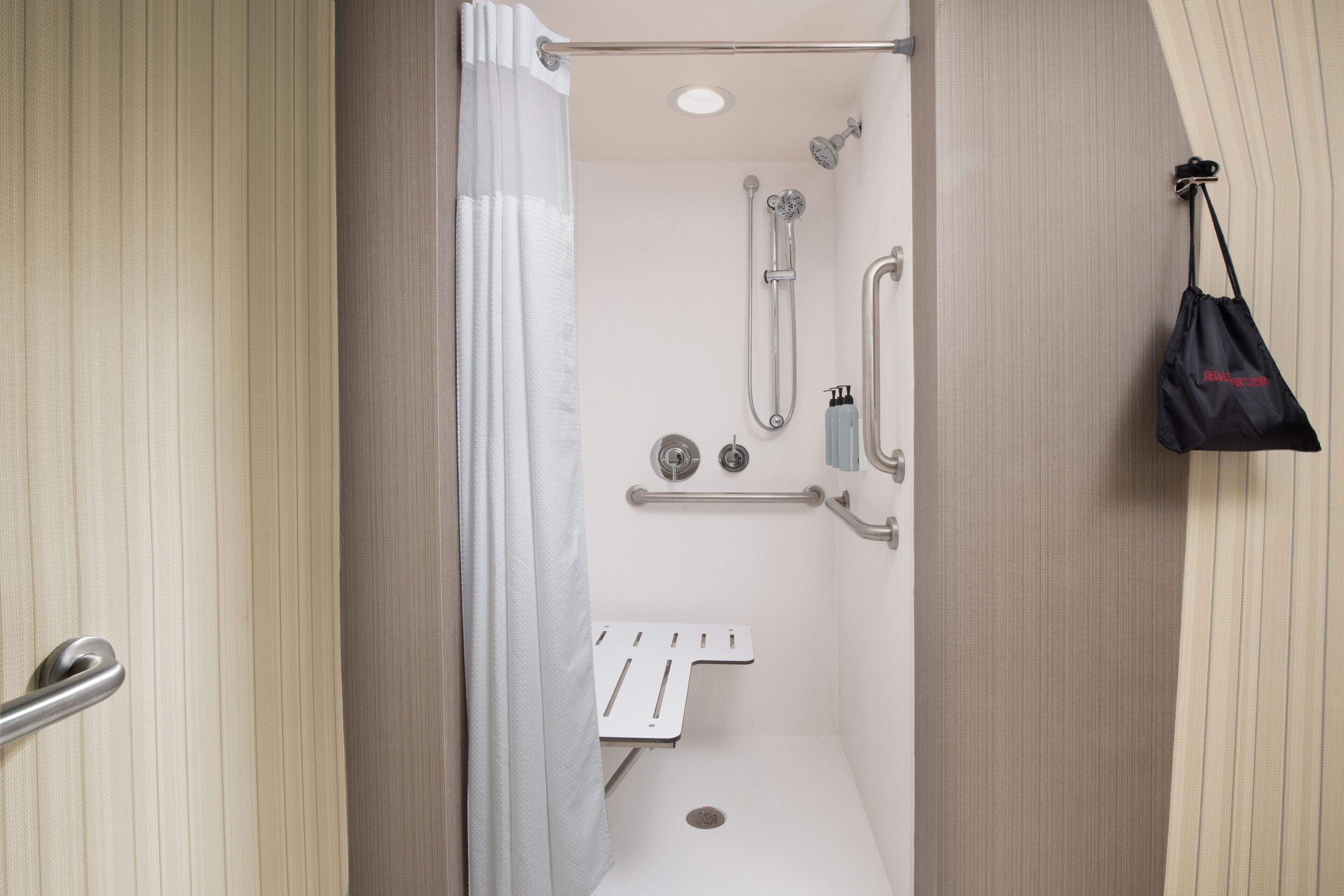 eco-friendly toiletries, hair dryer, towels, soap