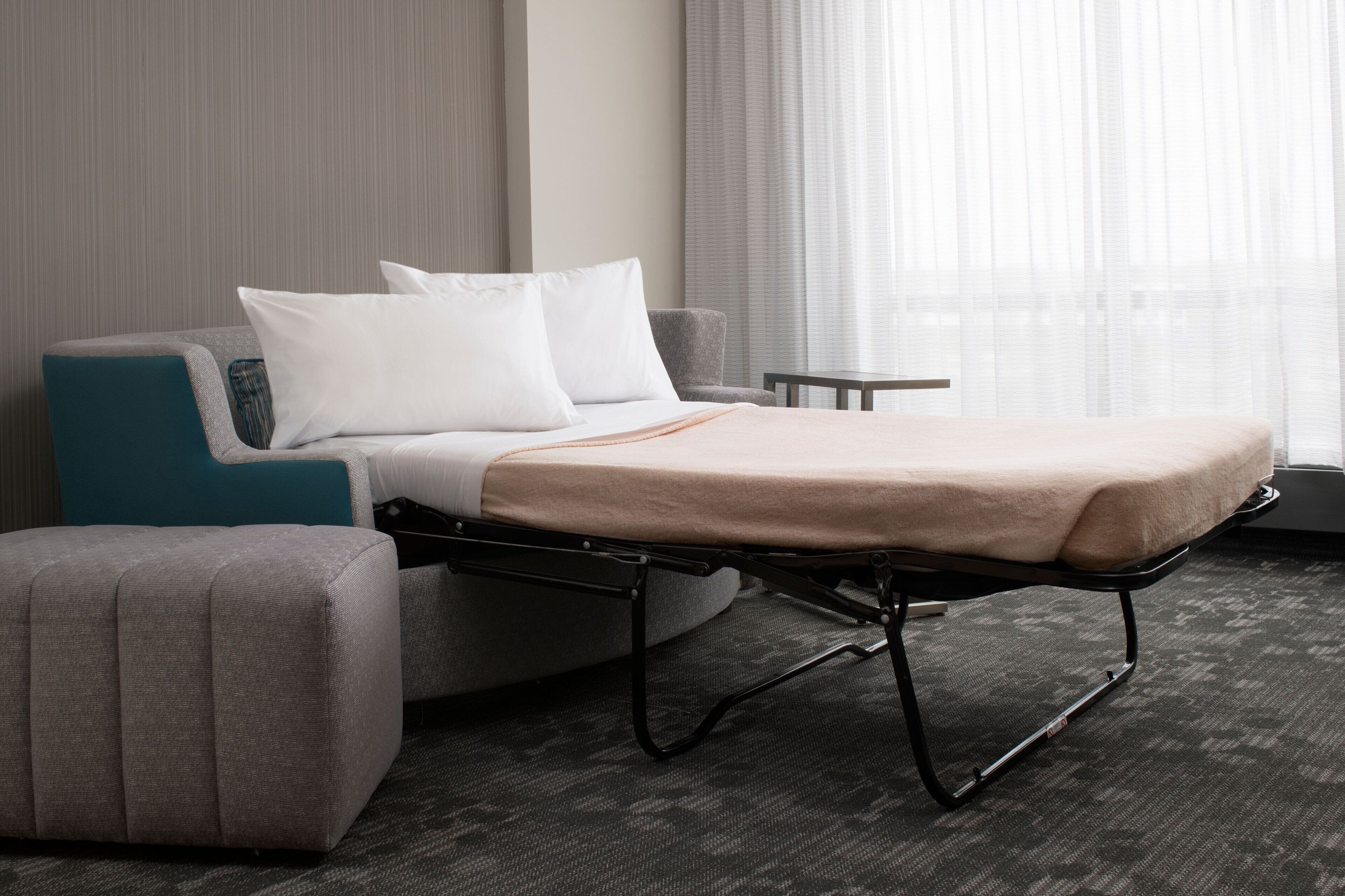 premium bedding, desk, laptop workspace, iron/ironing board