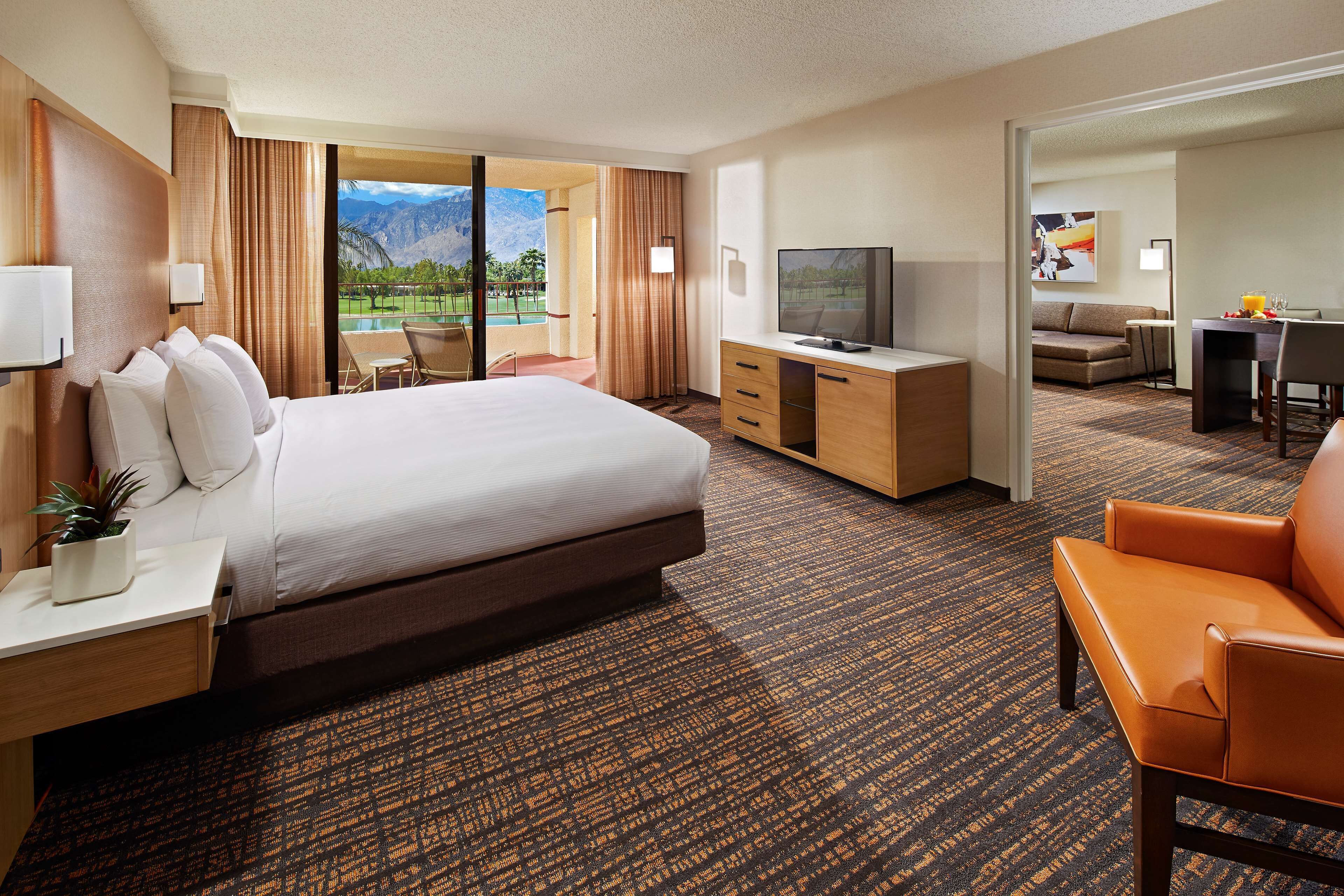 Premium bedding, down comforters, pillowtop beds, in-room safe