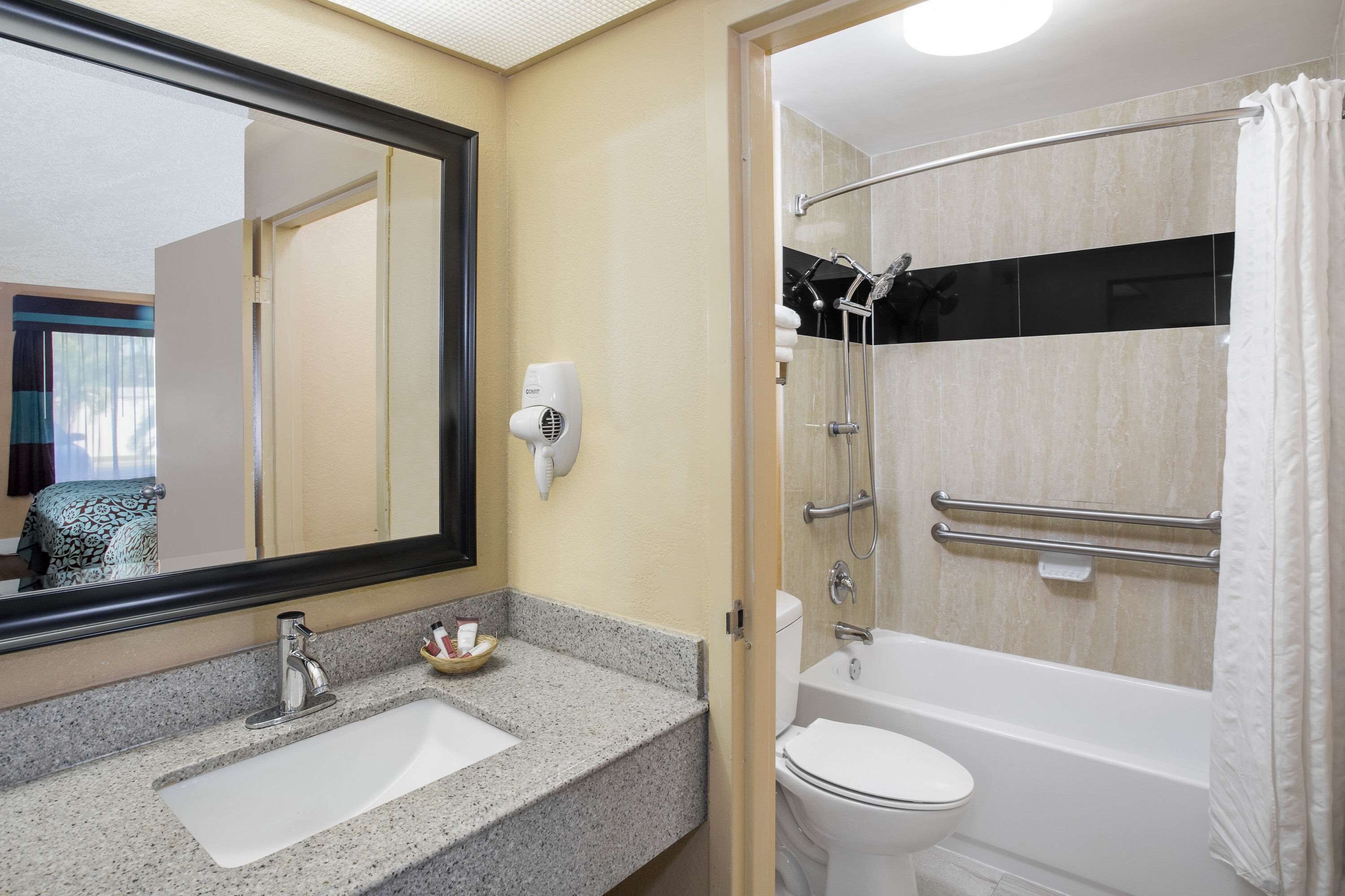 room, 2 double beds, accessible, non smoking | bathroom | combined shower/bathtub, rainfall showerhead, free toiletries