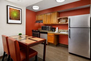 Full-sized fridge, microwave, stovetop, coffee/tea maker