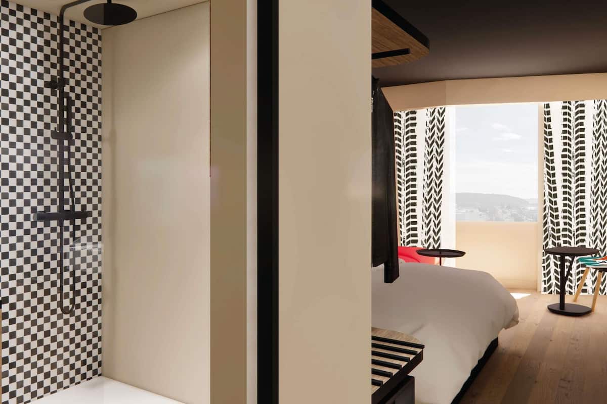 Premium bedding, desk, laptop workspace, blackout curtains