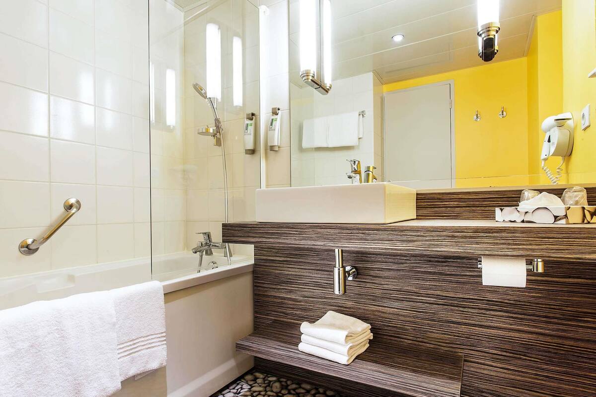 premium bedding, desk, laptop workspace, blackout curtains