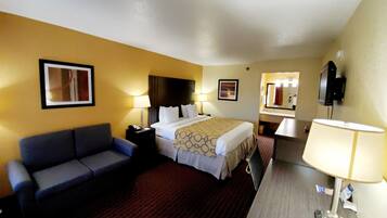 Desk, laptop workspace, blackout drapes, iron/ironing board