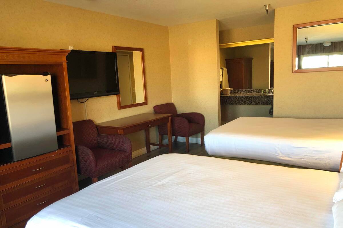 Standard Room, 2 Queen Beds | Blackout drapes, iron/ironing board, WiFi (free), alarm clocks