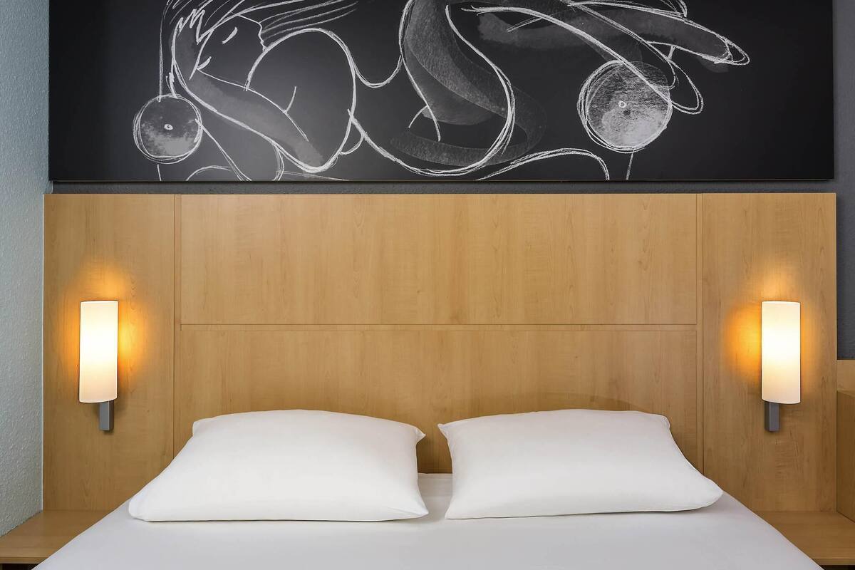 desk, blackout curtains, iron/ironing board, free cots/infant beds