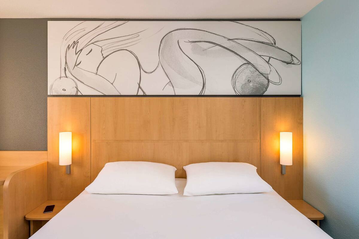 desk, blackout curtains, iron/ironing board, free cots/infant beds