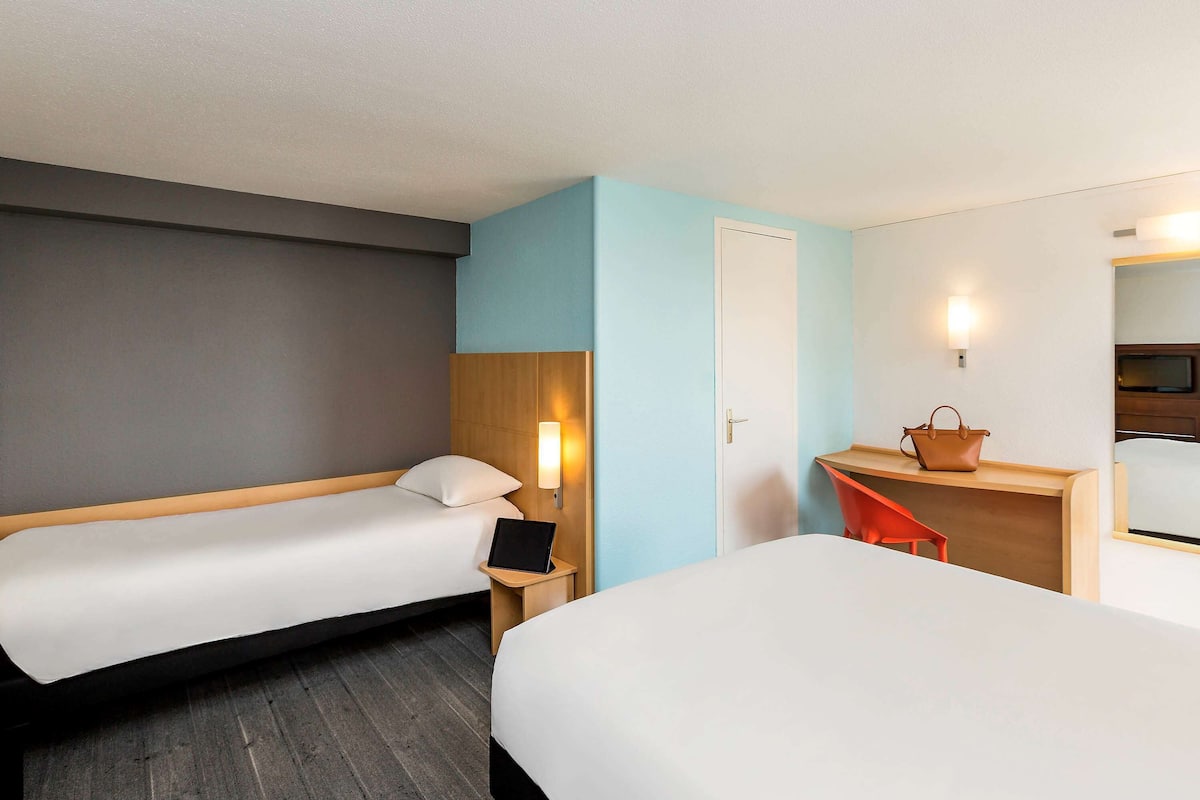 desk, blackout curtains, iron/ironing board, free cots/infant beds