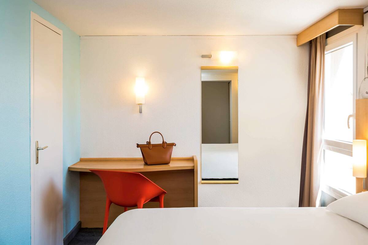 desk, blackout curtains, iron/ironing board, free cots/infant beds