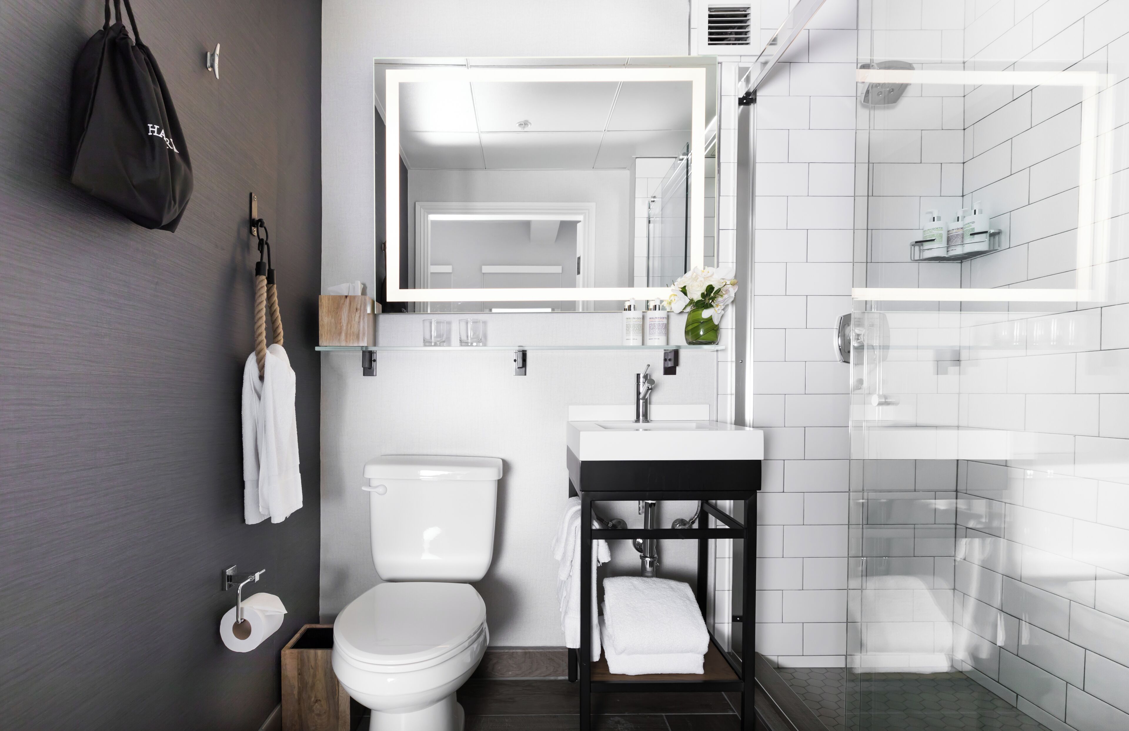 designer toiletries, hair dryer, bathrobes, towels