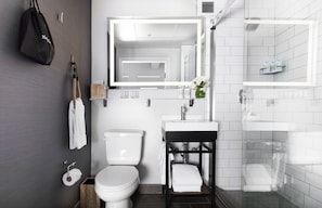 Designer toiletries, hair dryer, bathrobes, towels