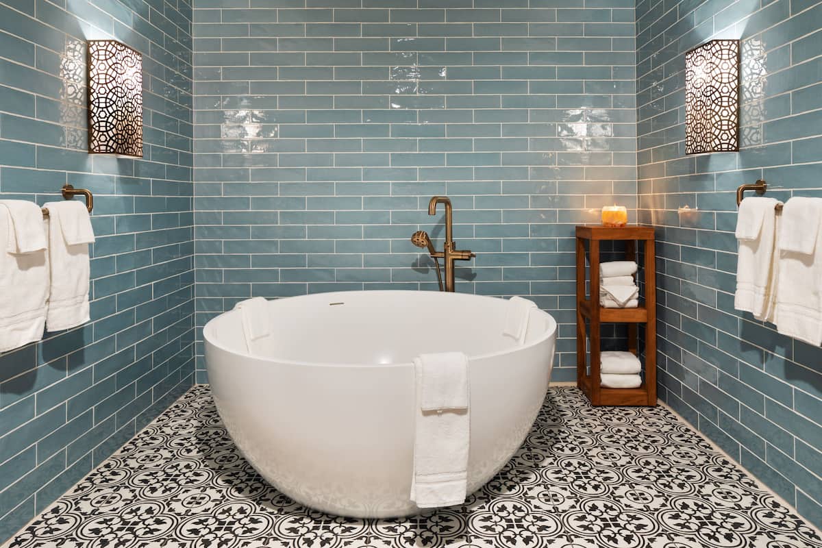 penthouse | bathroom | rainfall showerhead, eco-friendly toiletries, hair dryer, bathrobes