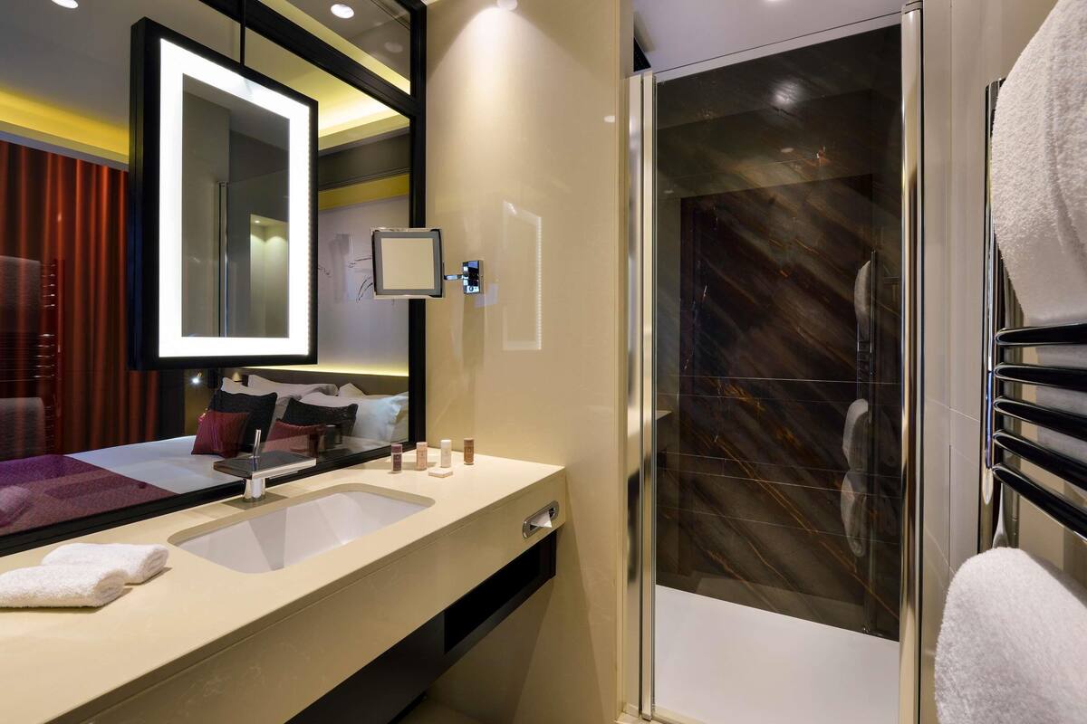 Premium bedding, pillow-top beds, free minibar, in-room safe