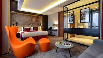 Premium bedding, pillow-top beds, free minibar, in-room safe