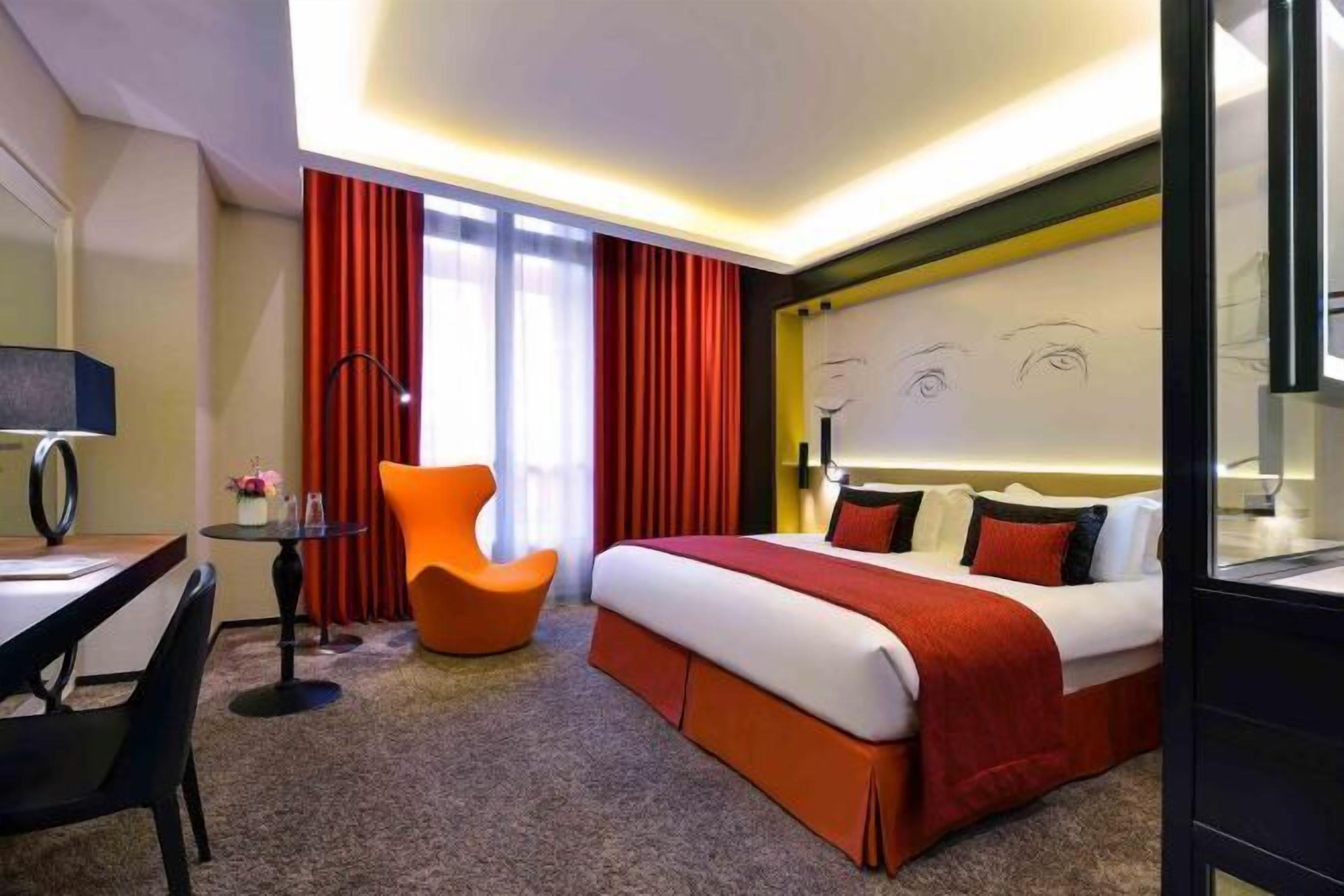 Premium bedding, pillow-top beds, free minibar, in-room safe