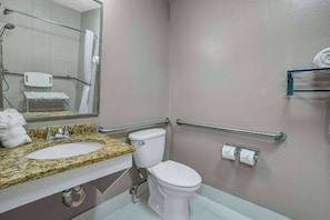 Room, 1 King Bed, Accessible, Non Smoking (Mobility, Roll-In Shower) | Bathroom | Combined shower/tub, free toiletries, towels