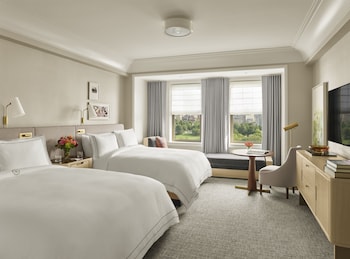 Frette Italian sheets, premium bedding, down comforters, minibar at The Newbury Boston