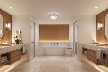 Designer toiletries, hair dryer, bathrobes, slippers at The Newbury Boston