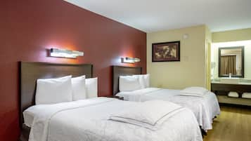 Premium Room, 2 Double Beds (Upgraded Bedding & Snack, Smoke Free) | Desk, laptop workspace, blackout drapes, free cribs/infant beds