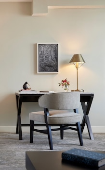 In-room safe, desk, blackout drapes, iron/ironing board at Capitol Hill Hotel