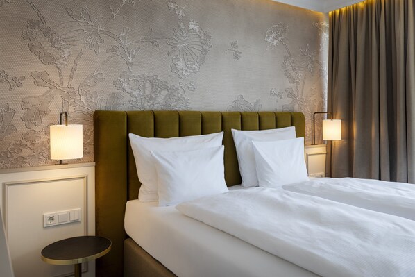 Junior Suite | 1 bedroom, premium bedding, in-room safe, blackout drapes