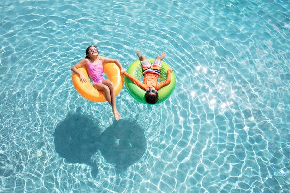 Outdoor pool, open 8:00 AM to 11:00 PM, pool umbrellas, pool loungers