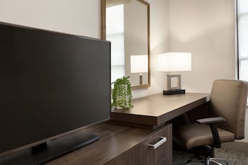 Suite, 1 King Bed with Sofa bed, Accessible, Non Smoking | Hypo-allergenic bedding, in-room safe, desk, laptop workspace at Buena Vista Suites Orlando