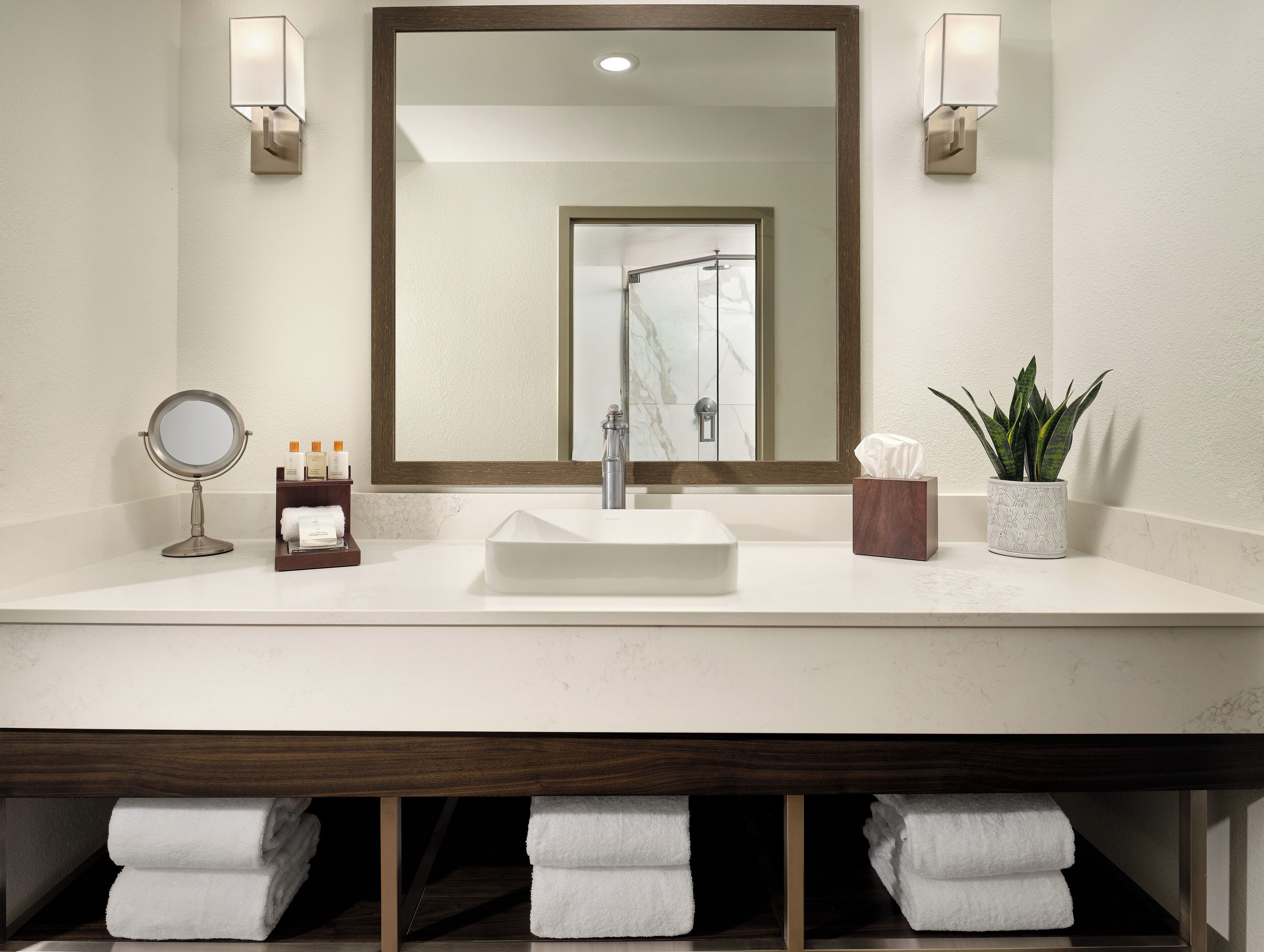 Shower, rainfall showerhead, designer toiletries, hair dryer