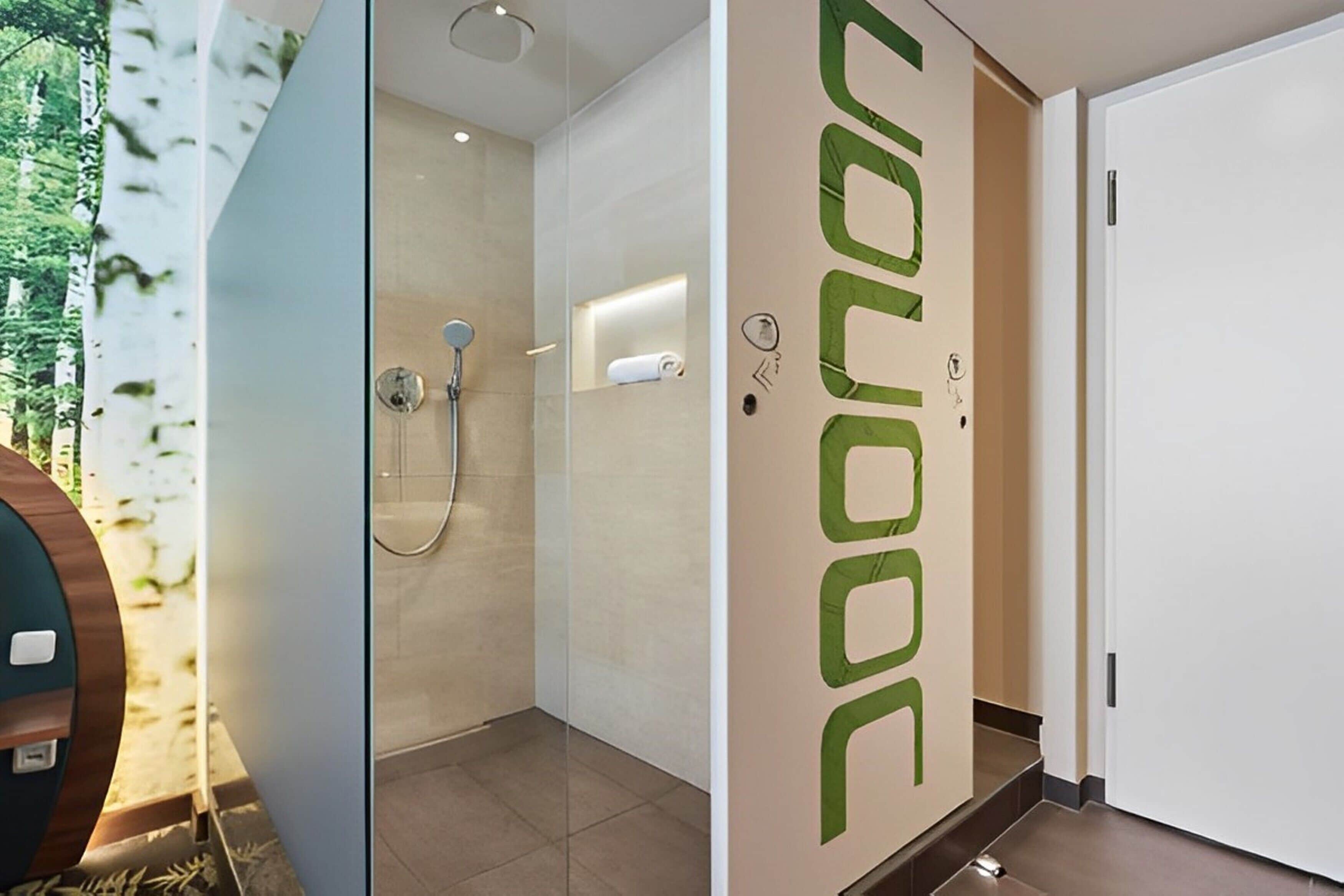 shower, rainfall showerhead, hair dryer, towels