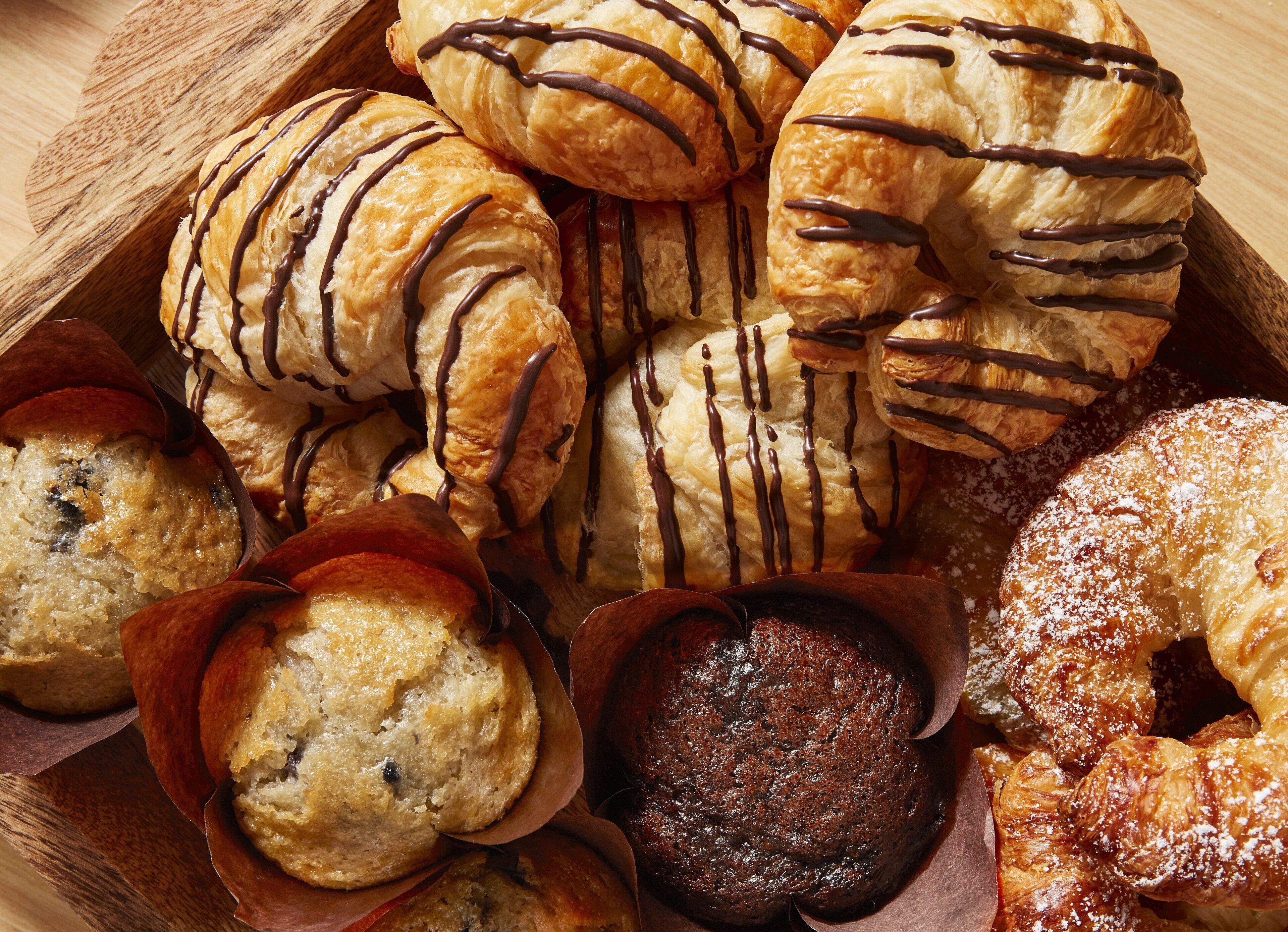 A variety of baked goods including pastries and muffins.