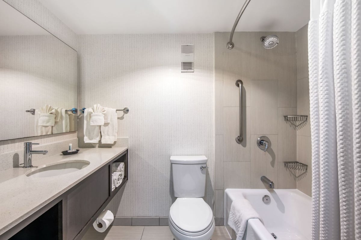 Suite, 1 Bedroom, Pool View | Premium bedding, down comforters, in-room safe, desk