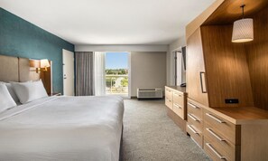 Suite, 1 Bedroom, Pool View | Premium bedding, down comforters, in-room safe, desk