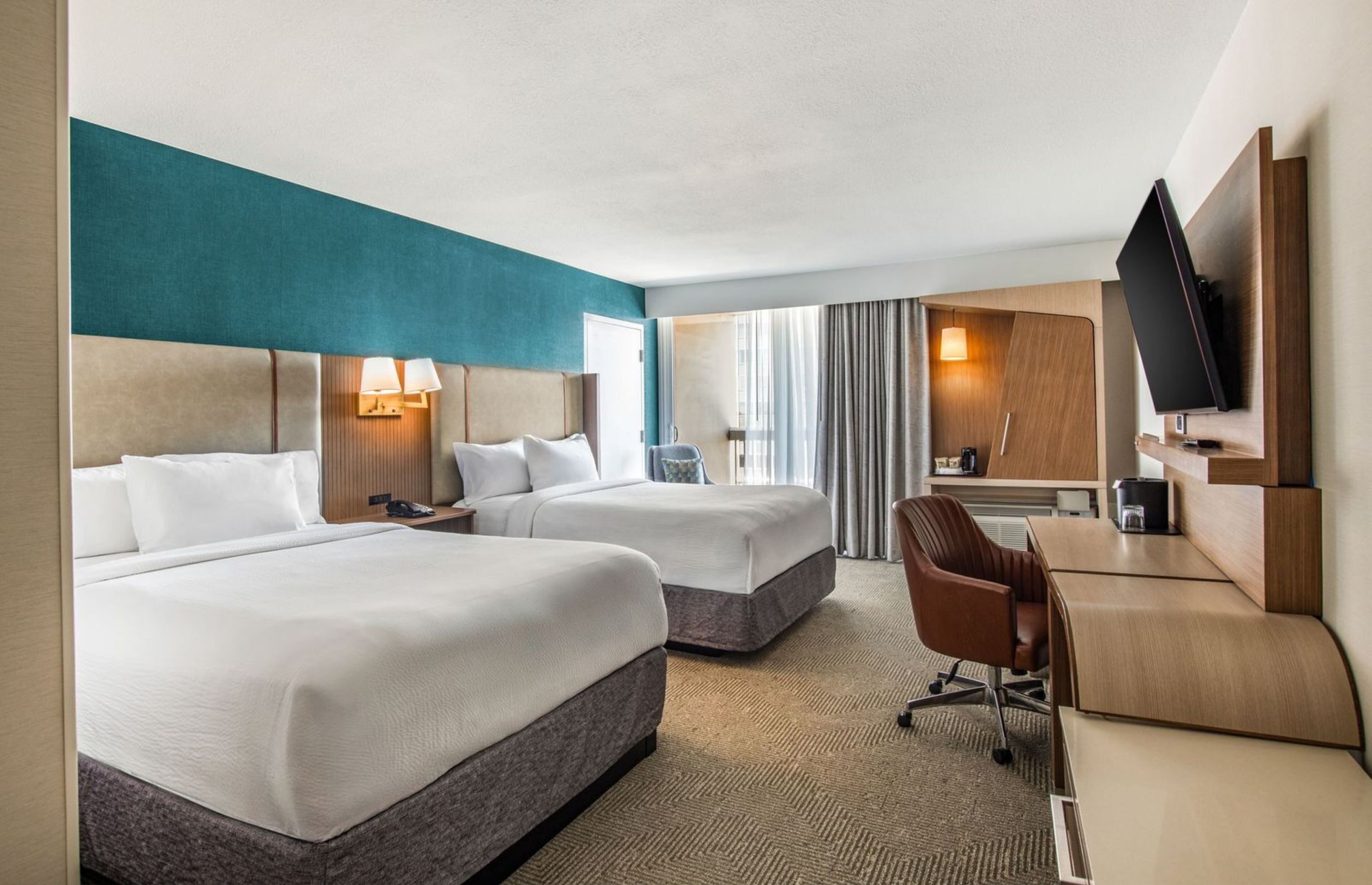 Premium bedding, down comforters, in-room safe, desk