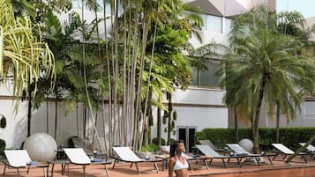 Outdoor pool, sun loungers