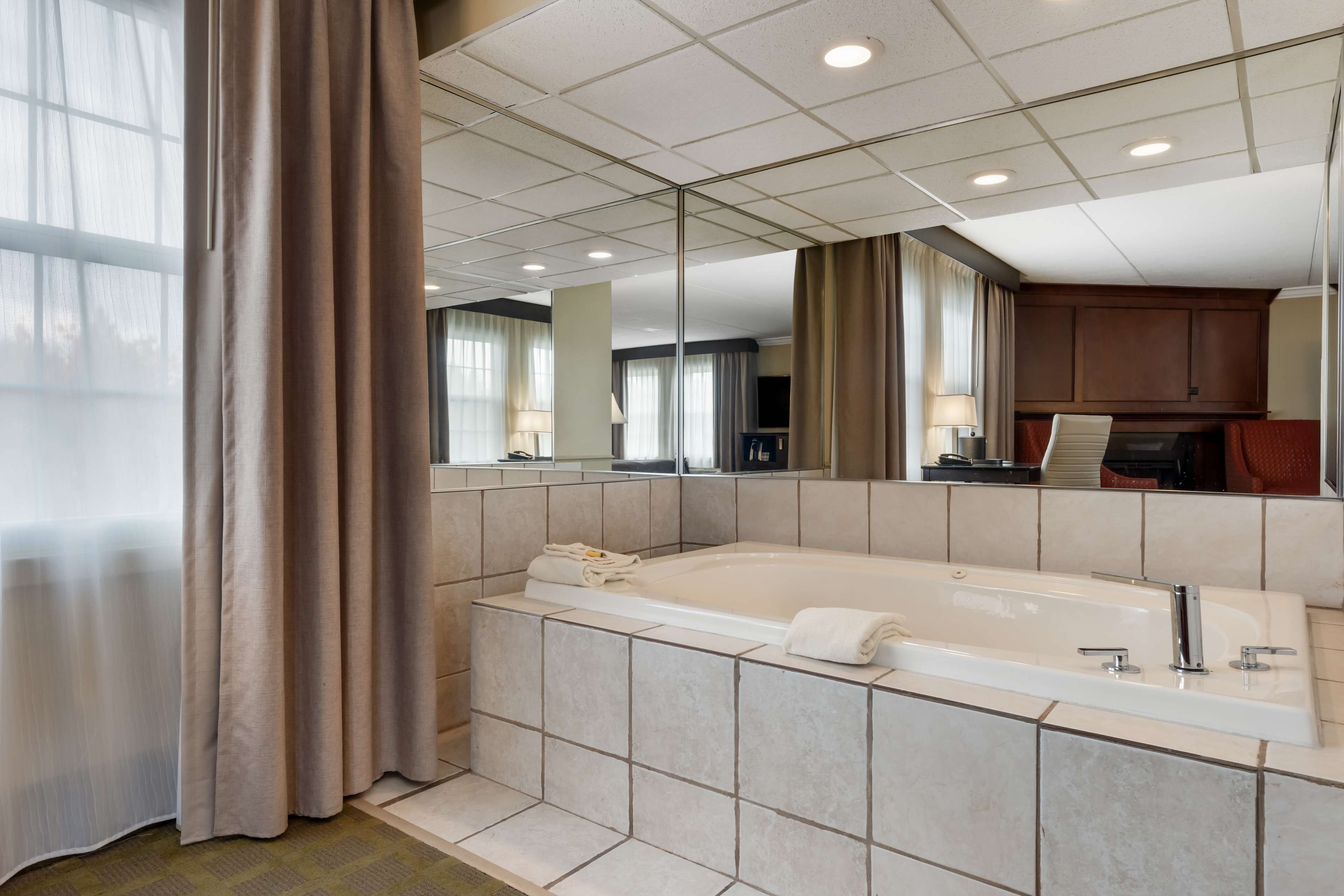 hypo-allergenic bedding, pillow-top beds, in-room safe, laptop workspace