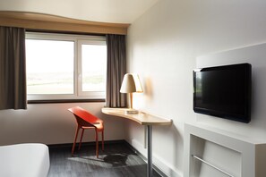 Desk, blackout drapes, soundproofing, iron/ironing board
