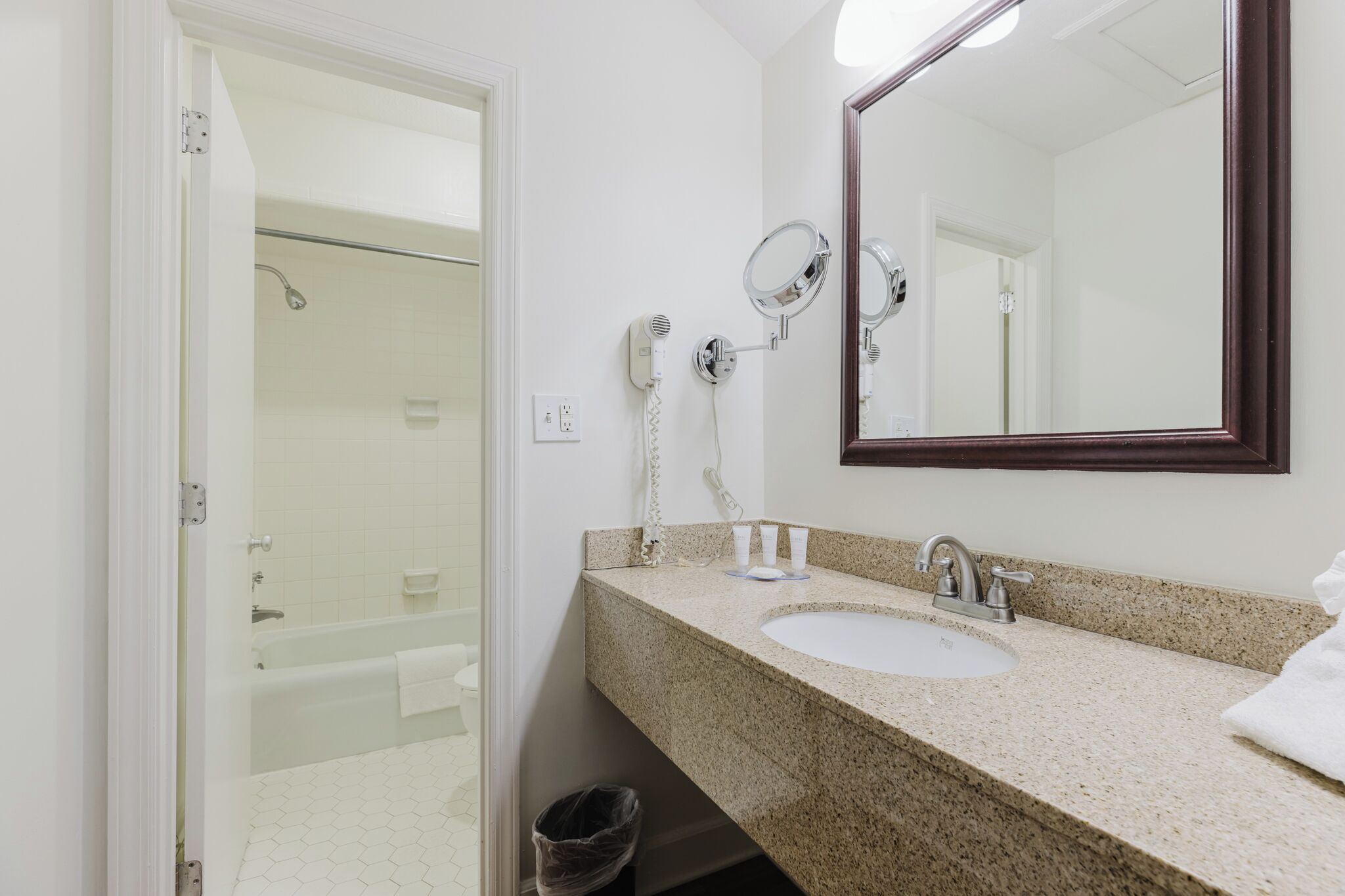 luxury suite | bathroom | combined shower/bathtub, hair dryer, towels