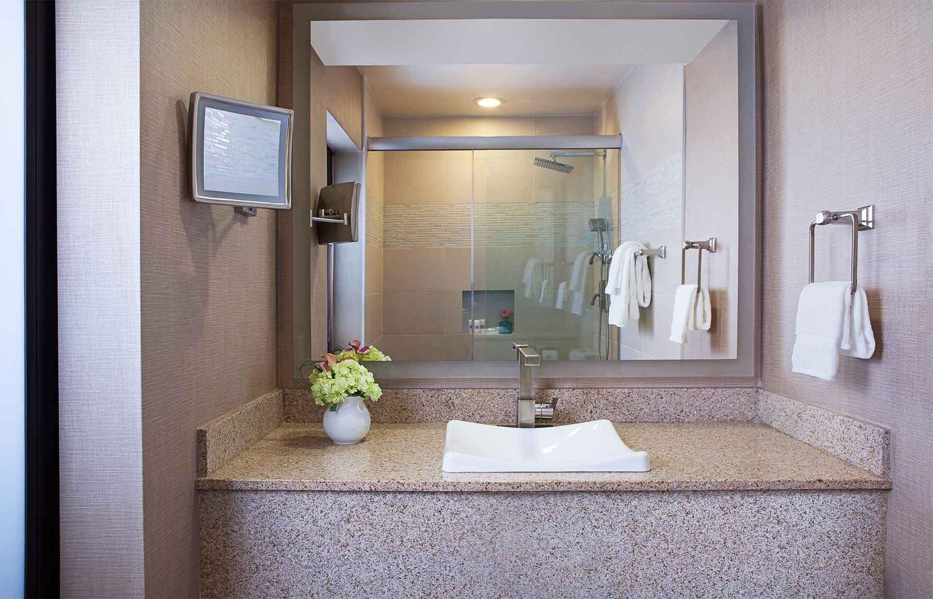 bathtub, designer toiletries, hair dryer, bathrobes