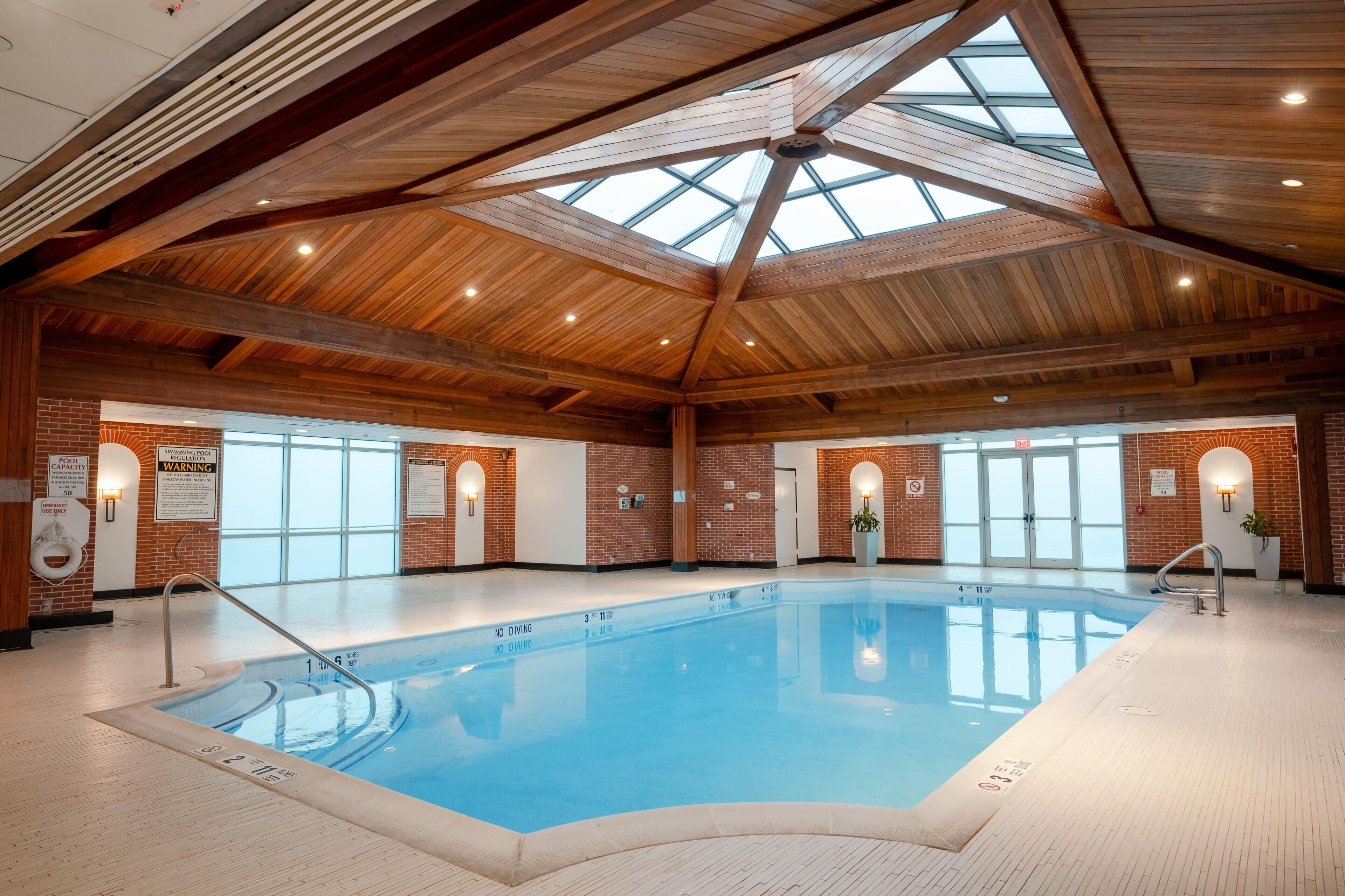 Indoor pool, open 9:00 AM to 11:00 AM, pool loungers