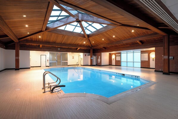 Indoor pool, open 9:00 AM to 11:00 AM, pool loungers