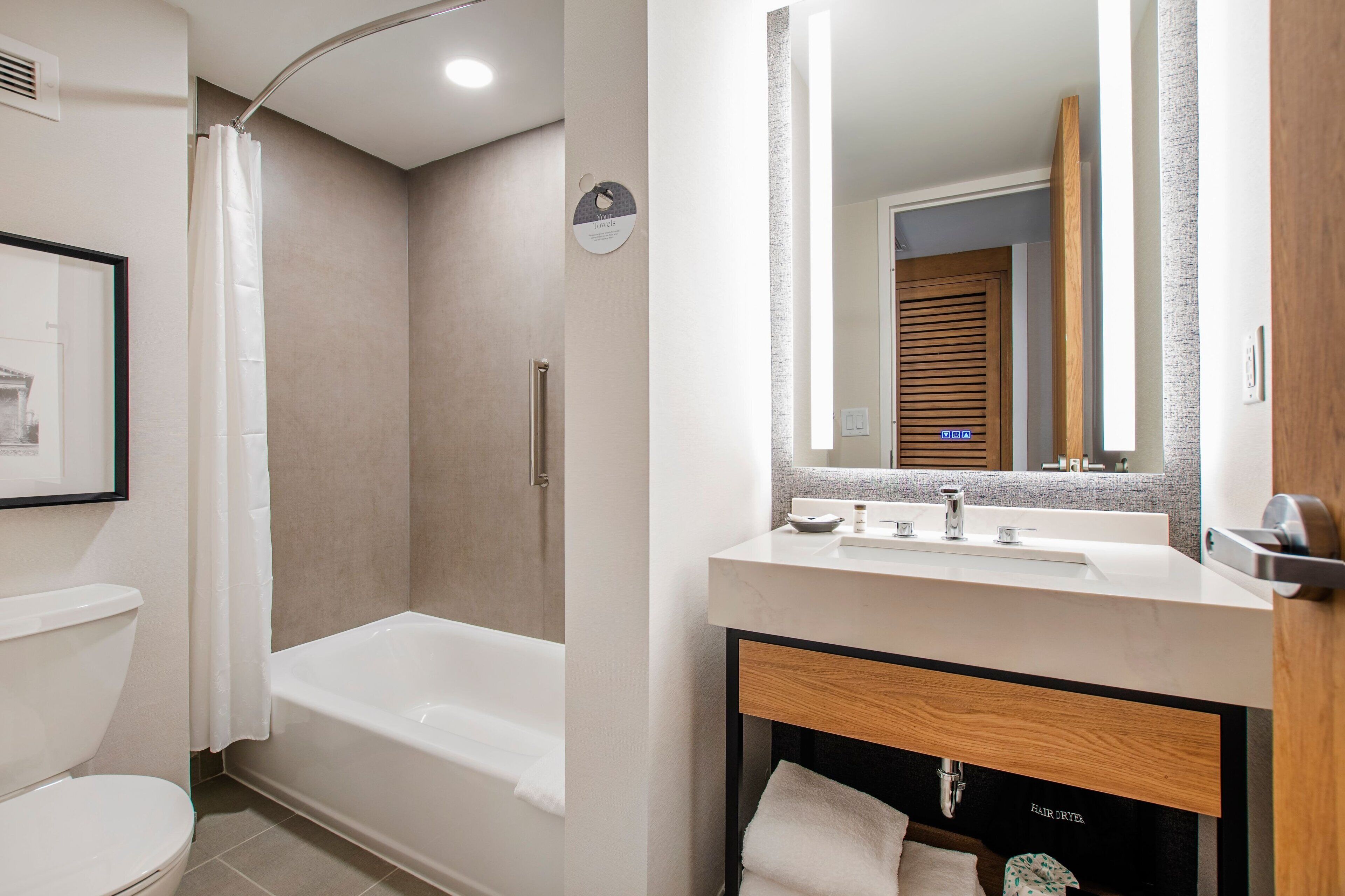 combined shower/bathtub, free toiletries, hair dryer, towels