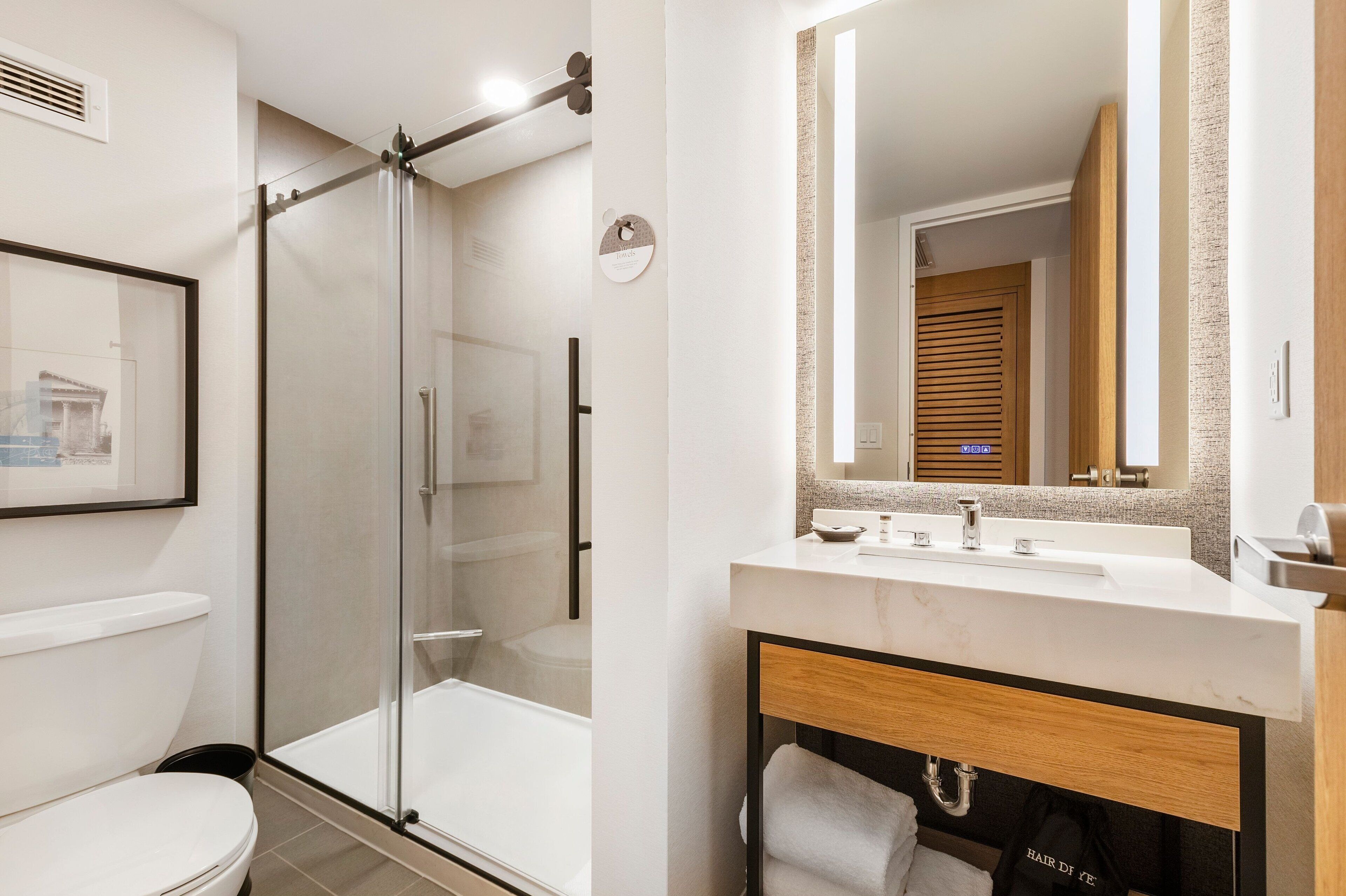 combined shower/bathtub, free toiletries, hair dryer, towels