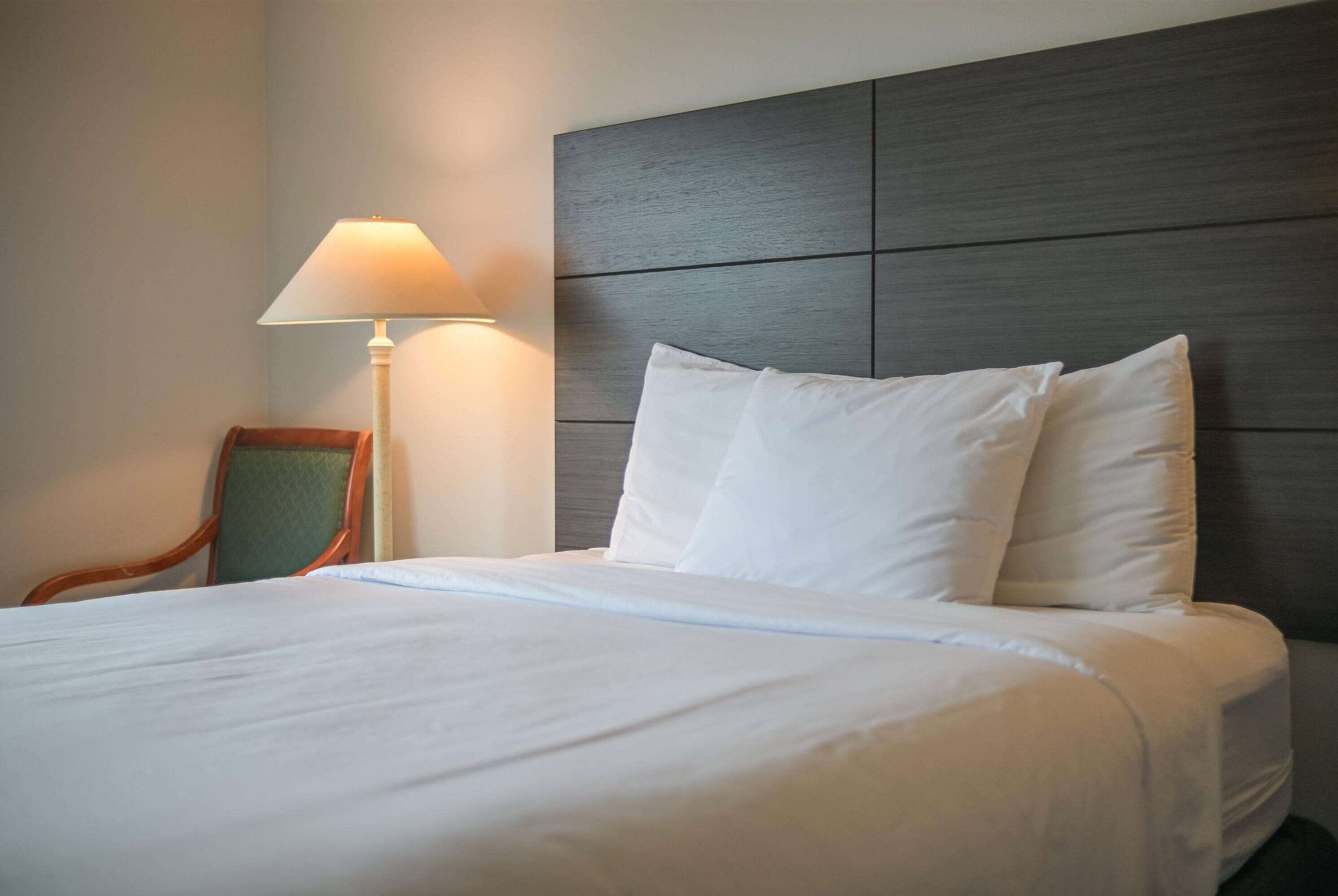 desk, blackout curtains, iron/ironing board, free cots/infant beds