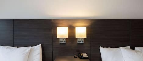 Desk, blackout drapes, iron/ironing board, free cribs/infant beds