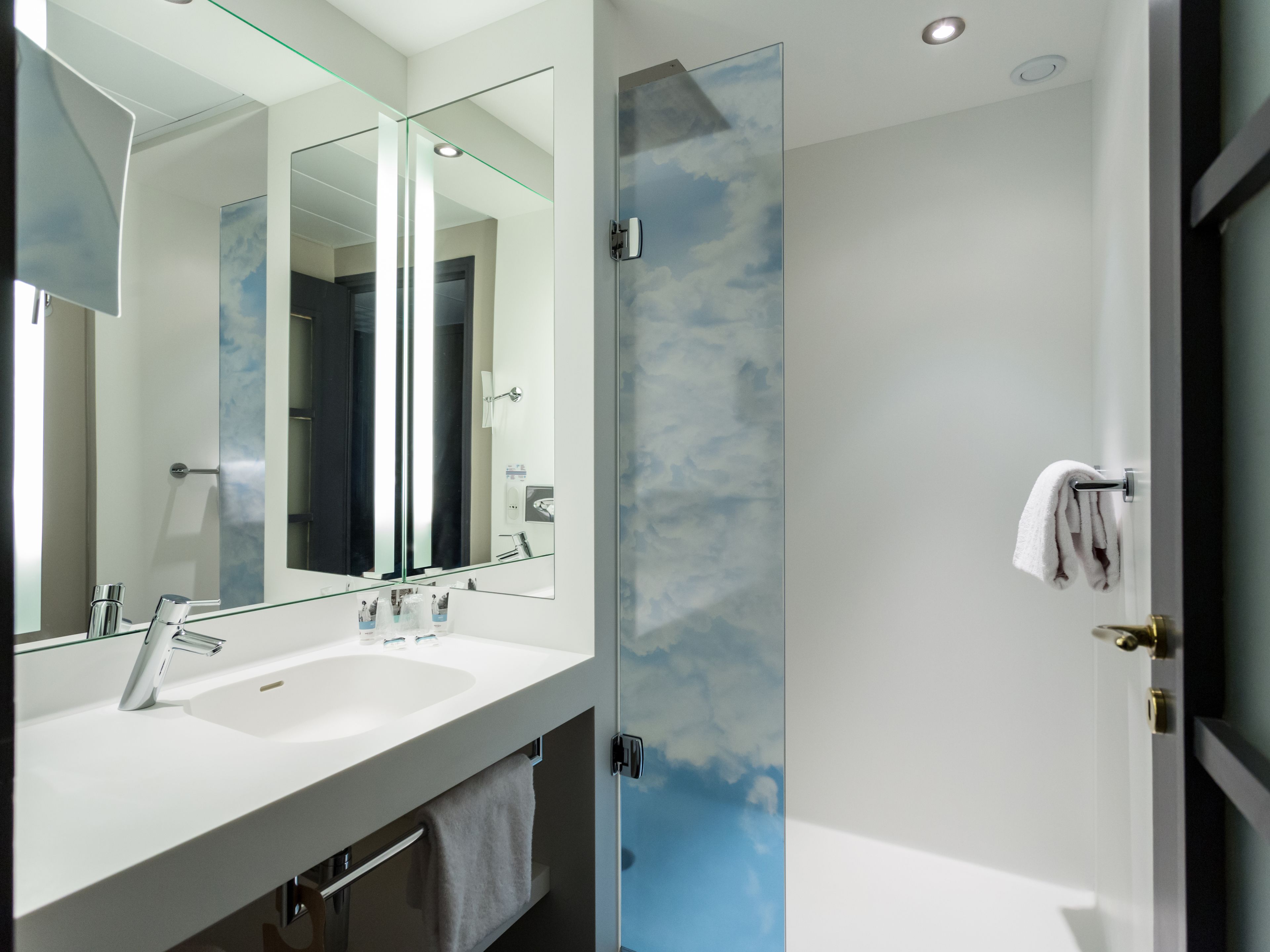 eco-friendly toiletries, hair dryer, towels